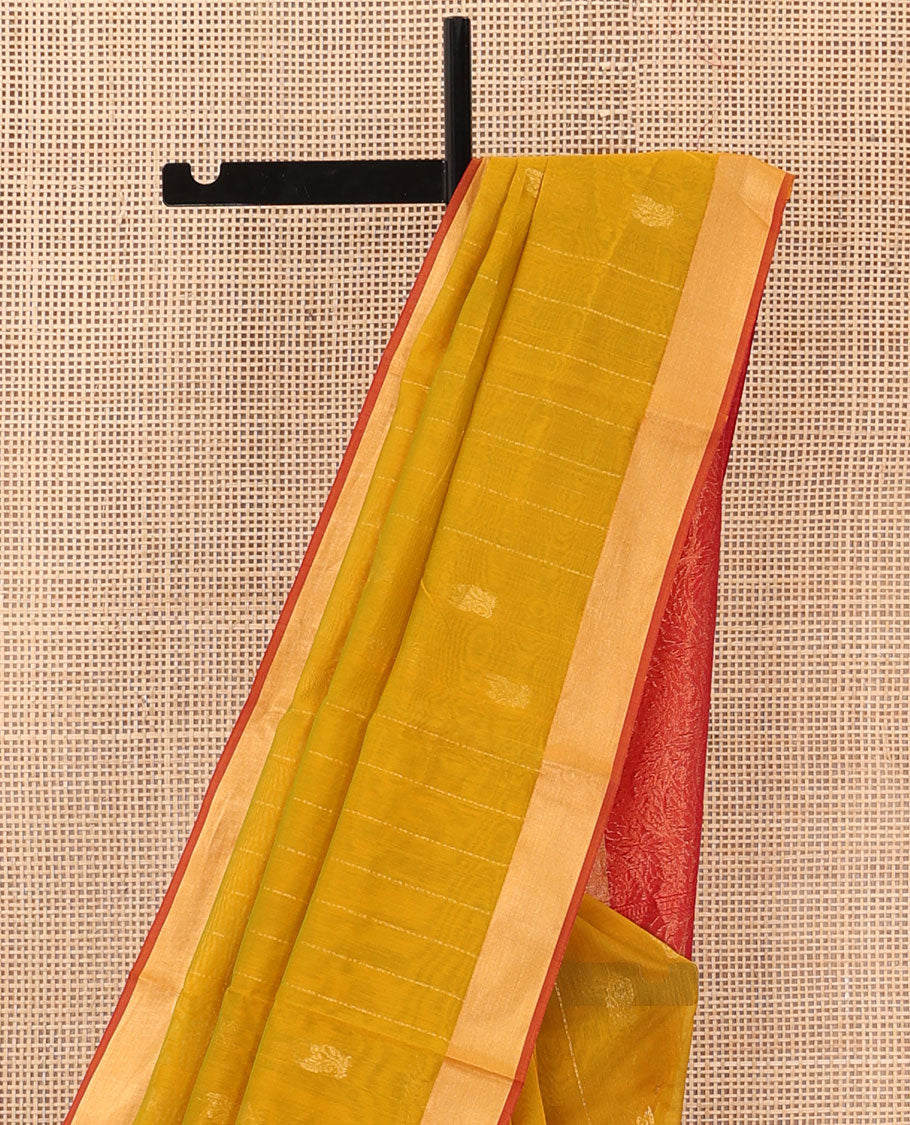 Mustard zari striped silk cotton saree, contrast bavanji border, and contrast pallu of floral creeper designs