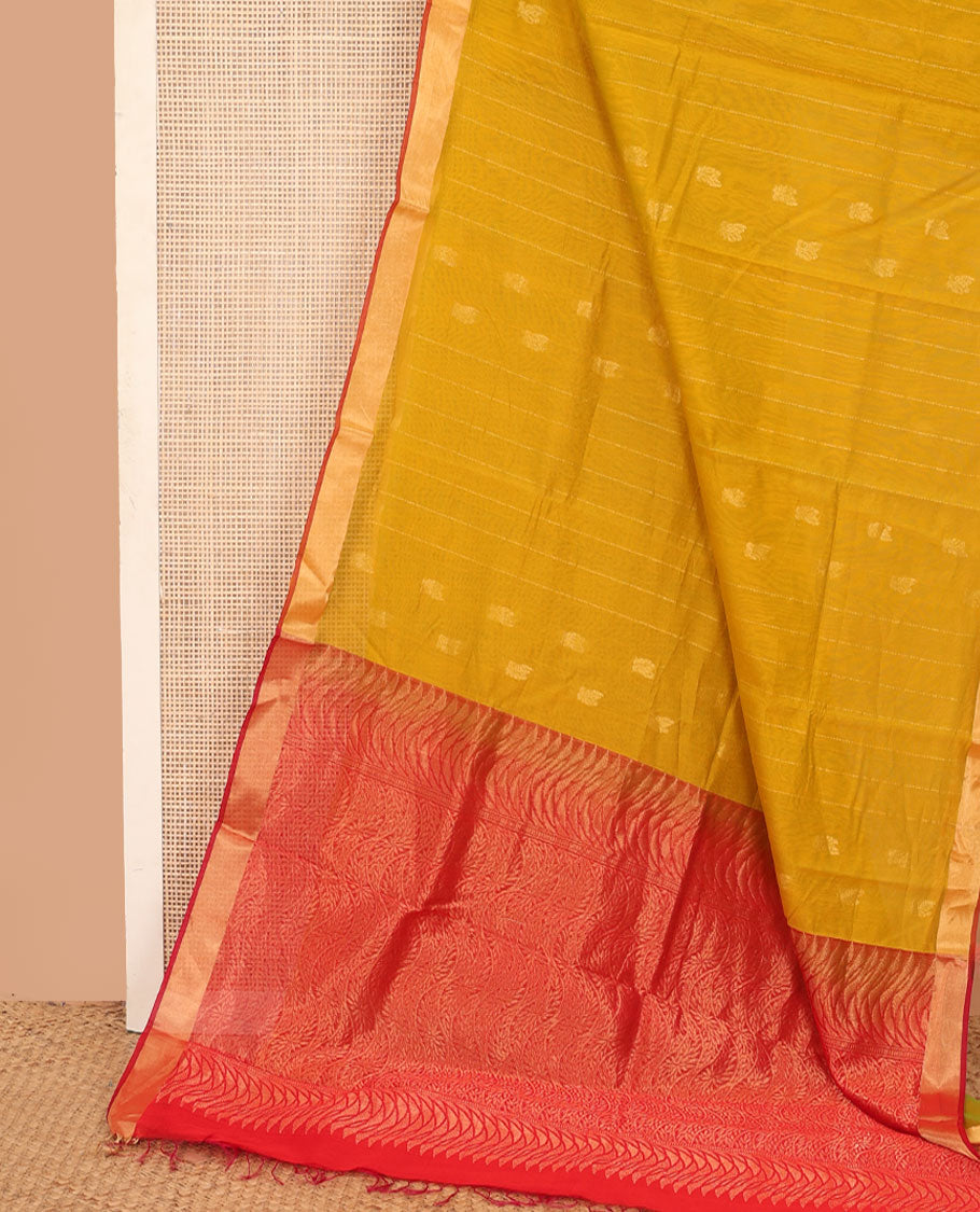 Mustard zari striped silk cotton saree, contrast bavanji border, and contrast pallu of floral creeper designs