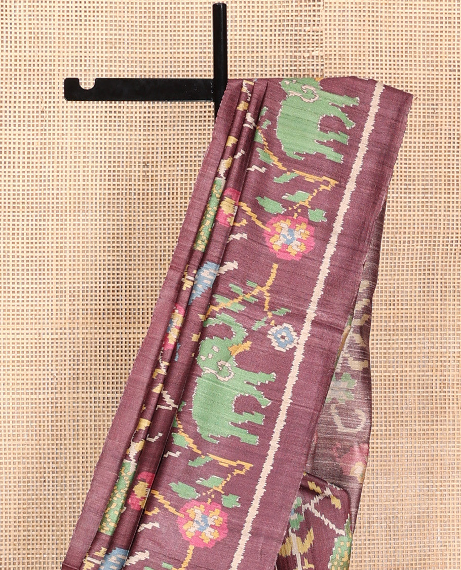 Brown Tussar Silk Saree, Artfully Detailed with Flora, Fauna, and Human Figurines Print on Its Body, a Subtle Border, Pallu Mirrors the Same Print, and Paired with a Matching Blouse