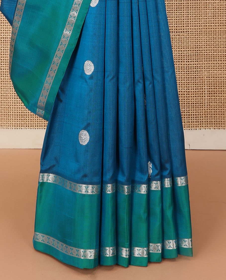 Blue peacock chakra buttas Venkatagiri silk saree, contrast rettai pettu rudraksham border, and thilakam design pallu