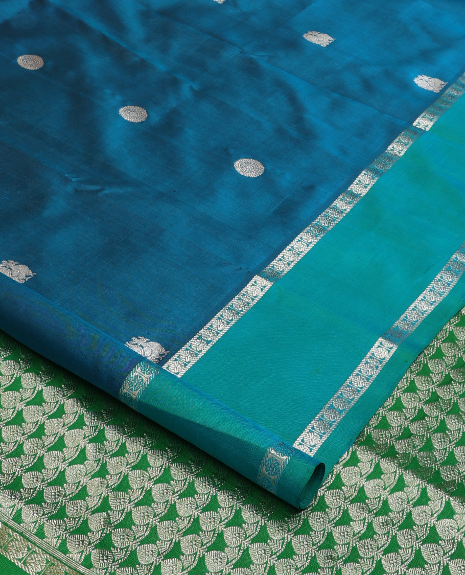 Blue peacock chakra buttas Venkatagiri silk saree, contrast rettai pettu rudraksham border, and thilakam design pallu