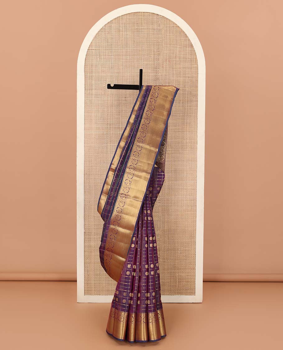 Purple annam chakram enclosed zari checked Vasundhara silk mix saree, zari border of rekku and kodi mayil designs, and jaal pallu