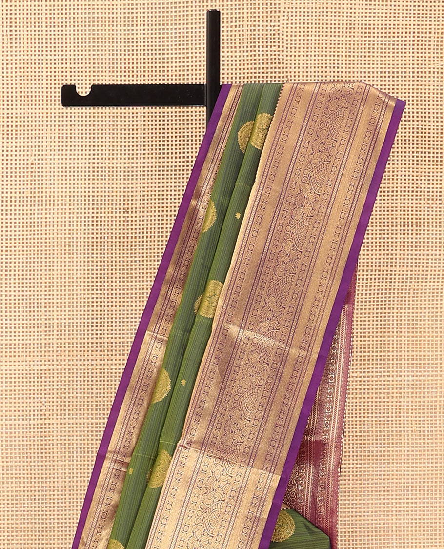 Green Vasundhara Lite Silk Mix Saree Highlighted with Chakram Buttas, Accentuated by a Contrast Border Featuring Rekku, Muthu, Kathir, Chakram, Star, and Mayil Designs, Pallu of Jaal design, and a Contrast Blouse