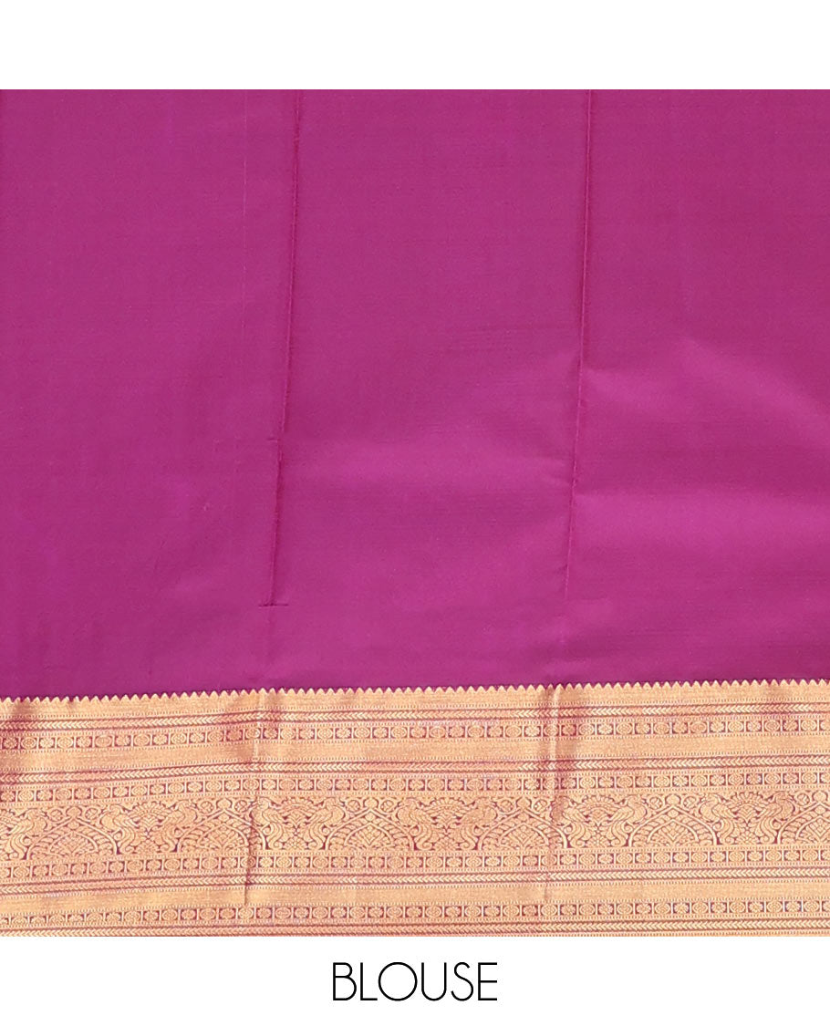 Green Vasundhara Lite Silk Mix Saree Highlighted with Chakram Buttas, Accentuated by a Contrast Border Featuring Rekku, Muthu, Kathir, Chakram, Star, and Mayil Designs, Pallu of Jaal design, and a Contrast Blouse