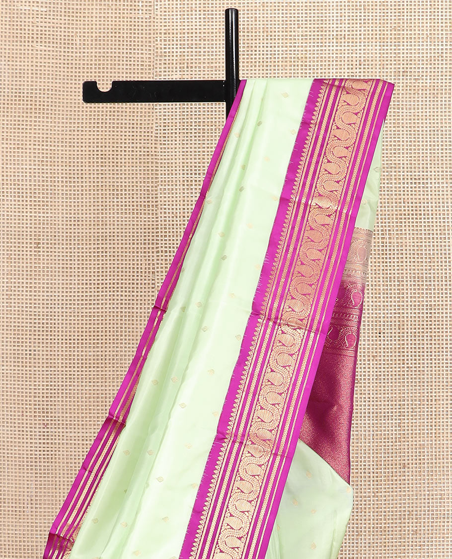 Green zari buttas silk saree, contrast border of thilakam mokku, kathir, banaras, and vanki manga kodi designs, and jaal pallu