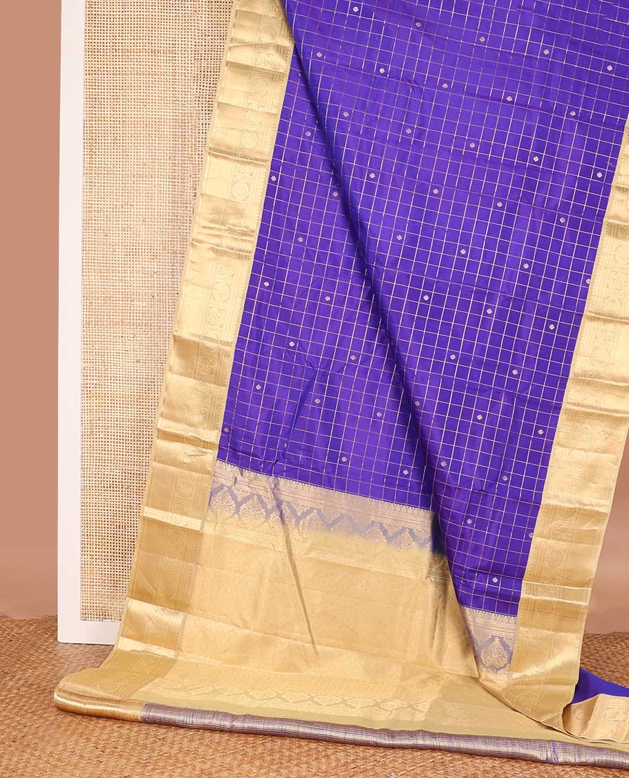 Blue zari kamalam buttas enclosed checked silk saree, contrast border of thilakam mokku, banaras, kathir, and mayil chakram, and jaal pallu