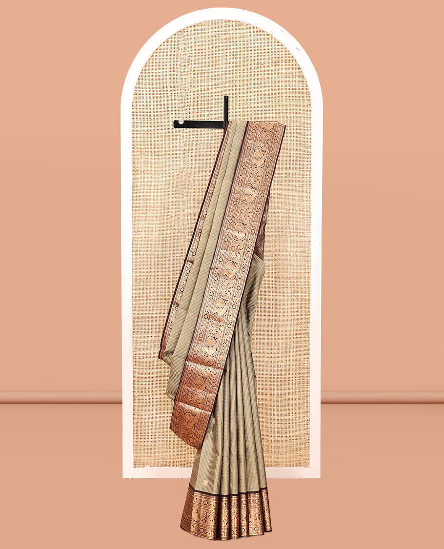 Beige Vasundhara Silk Saree, Meticulously Crafted with Zari Buttas and Checks, a Contrast Border of Thilakam Mokku, Paisa, Kamalam, Yaanai, and Mayil, Jaal Pallu, and a Contrast Blouse