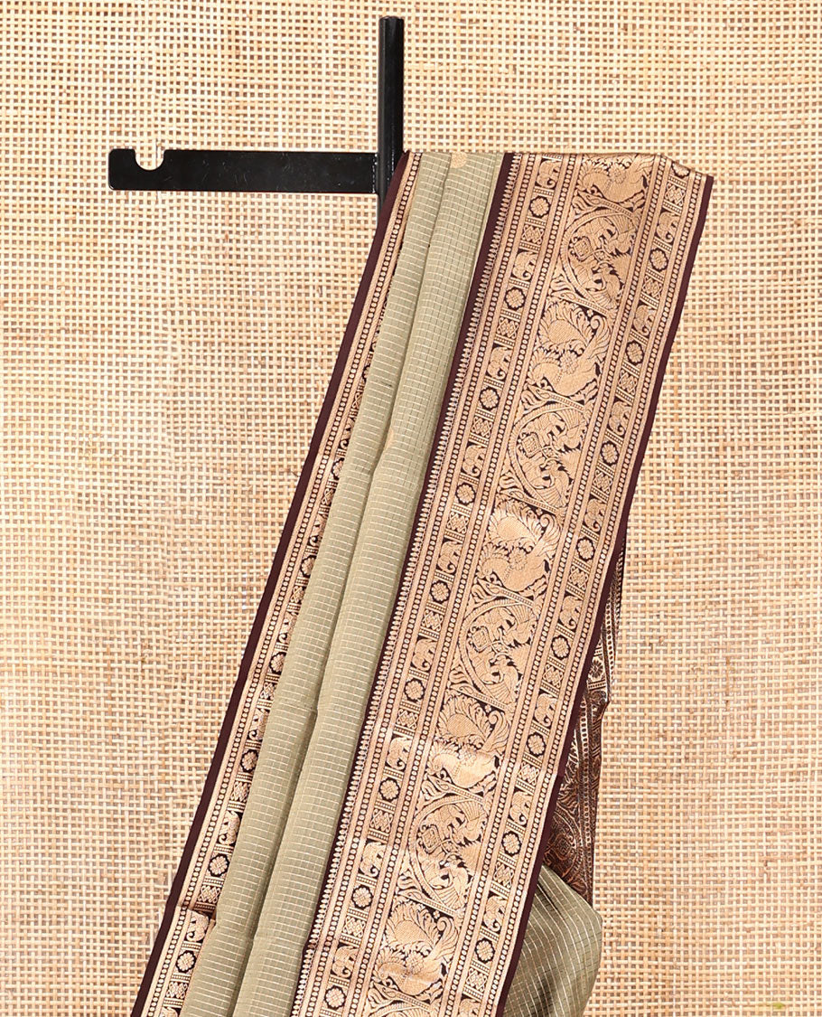 Beige Vasundhara Silk Saree, Meticulously Crafted with Zari Buttas and Checks, a Contrast Border of Thilakam Mokku, Paisa, Kamalam, Yaanai, and Mayil, Jaal Pallu, and a Contrast Blouse