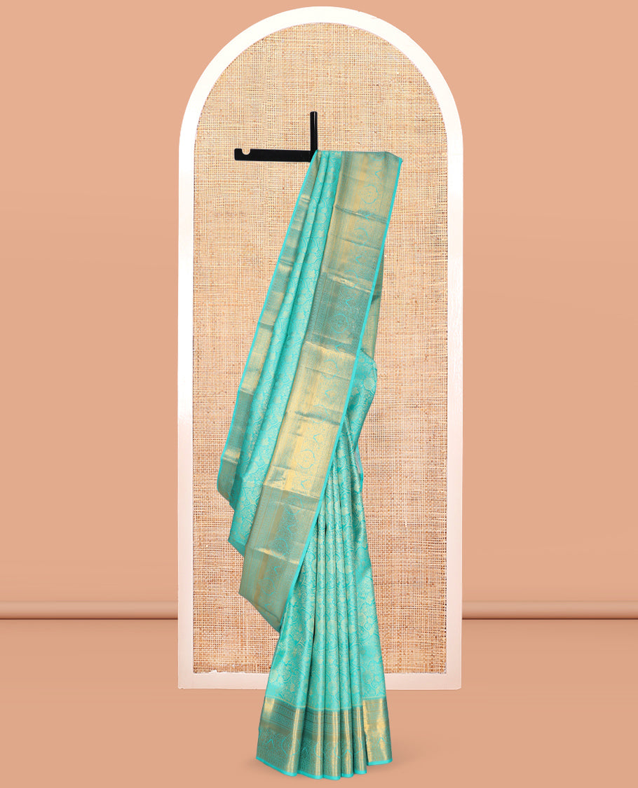 Turquoise Jacquard Kanchipuram Wedding Silk Saree, Highlighted by a Zari Border of Rekku, Muthu, Poun, Kodi Visiry, and Mayil Kann Designs, Grand Pallu, and Matching Blouse