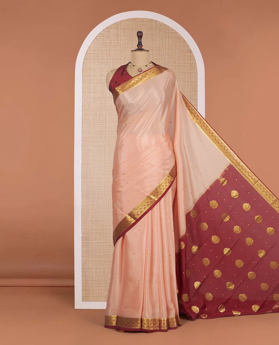 Light Peach Mysore Silk Saree, Mesmerized with Zari Buttas All Over Its Body, Complemented by a Contrast Traditional Zari Design Border, Zari-Buttas Woven Pallu, and Paired with a Contrast Blouse