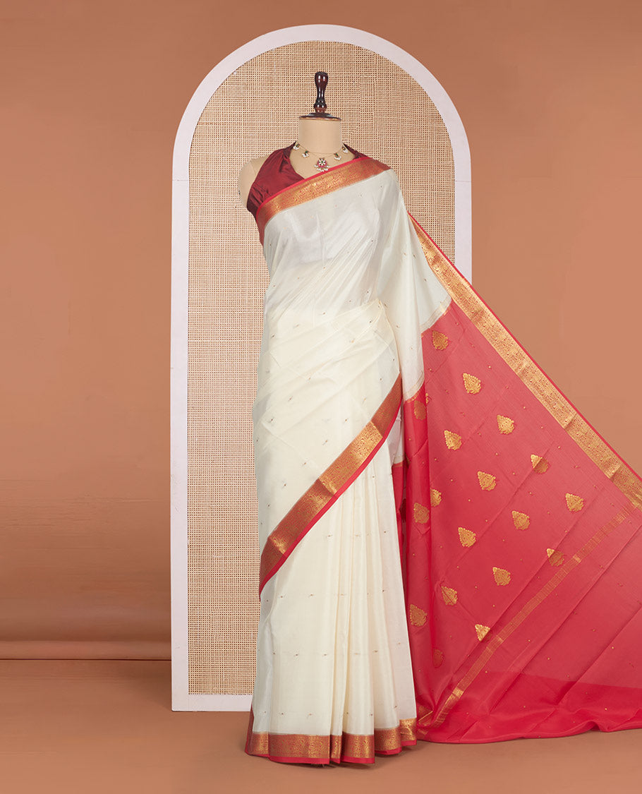 White Mysore Silk Saree, Sparsely Sparkled with Zari Buttas All Over Its Body, Complemented by a Contrast Traditional Zari Design Border, Zari-Buttas Woven Pallu, and Paired with a Contrast Blouse