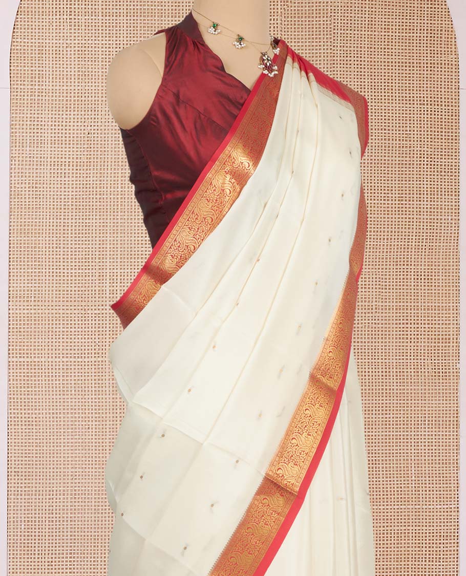 White Mysore Silk Saree, Sparsely Sparkled with Zari Buttas All Over Its Body, Complemented by a Contrast Traditional Zari Design Border, Zari-Buttas Woven Pallu, and Paired with a Contrast Blouse