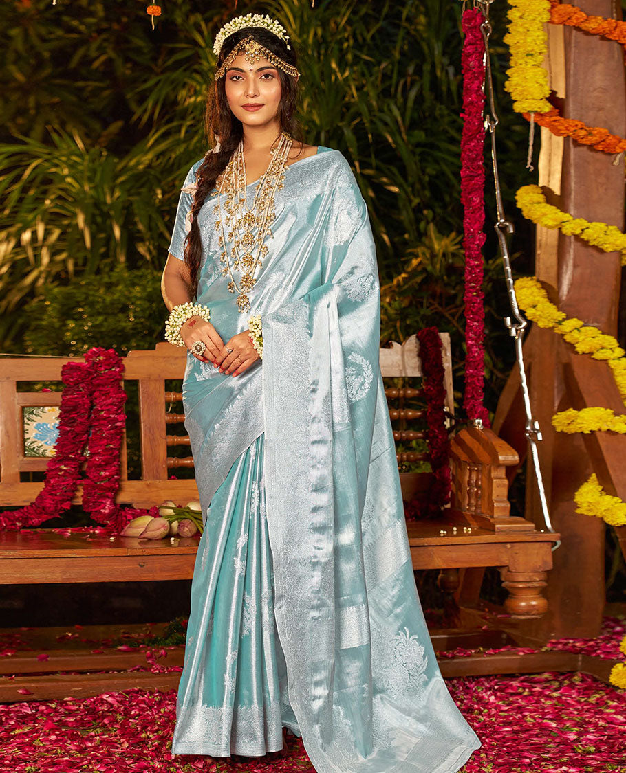 Pale Blue Designer Catalog Saree, Sparsely Woven with Floral Buttas All Over Its Body, Subtly Floral Design Border, Pallu Pictures Floral Designs, and Paired with a Matching Blouse