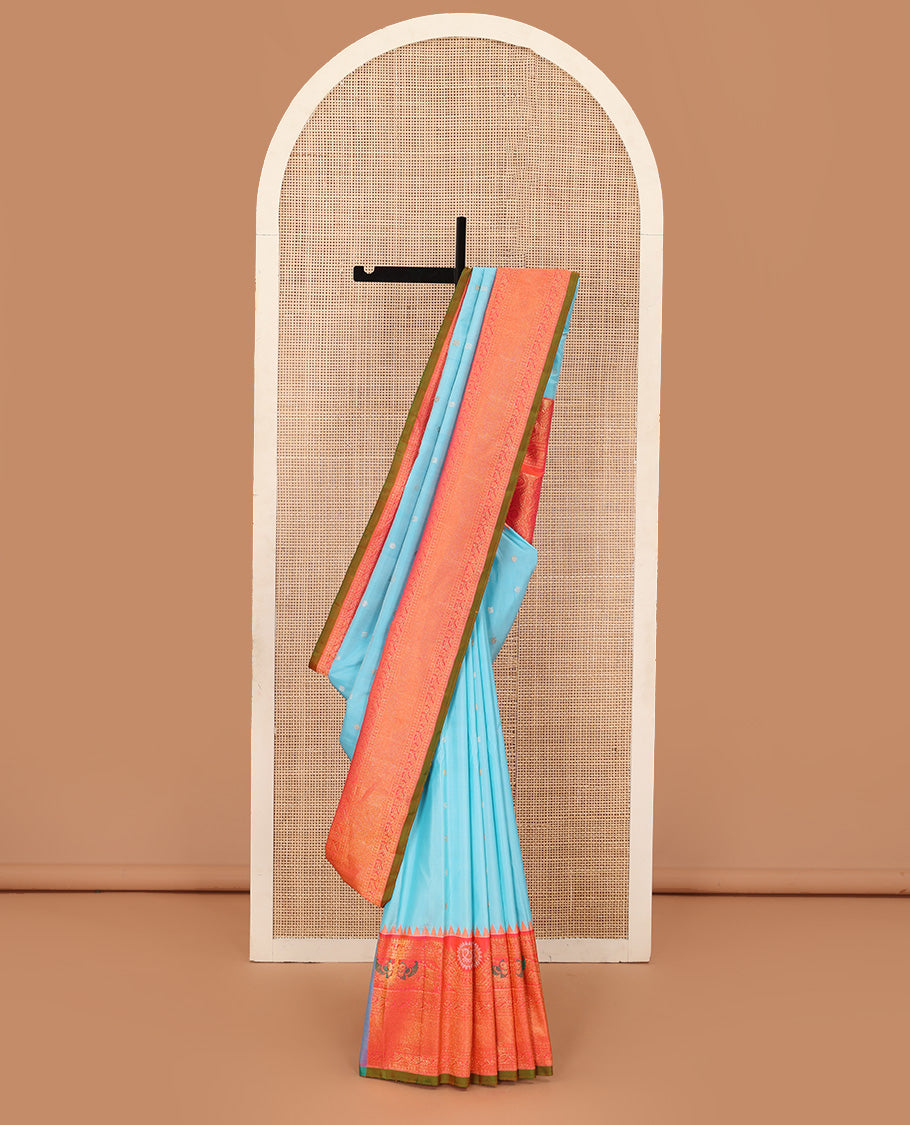 Baby blue mayil chakram buttas gadwal silk saree, contrast border of rekku, mayil, and kodi visiry designs, and intricate pallu