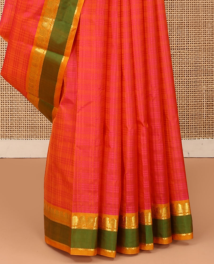 Pink Kanchipuram silk saree, contrast rettai pettu border of manga, neli, and diamond designs, and zari striped pallu