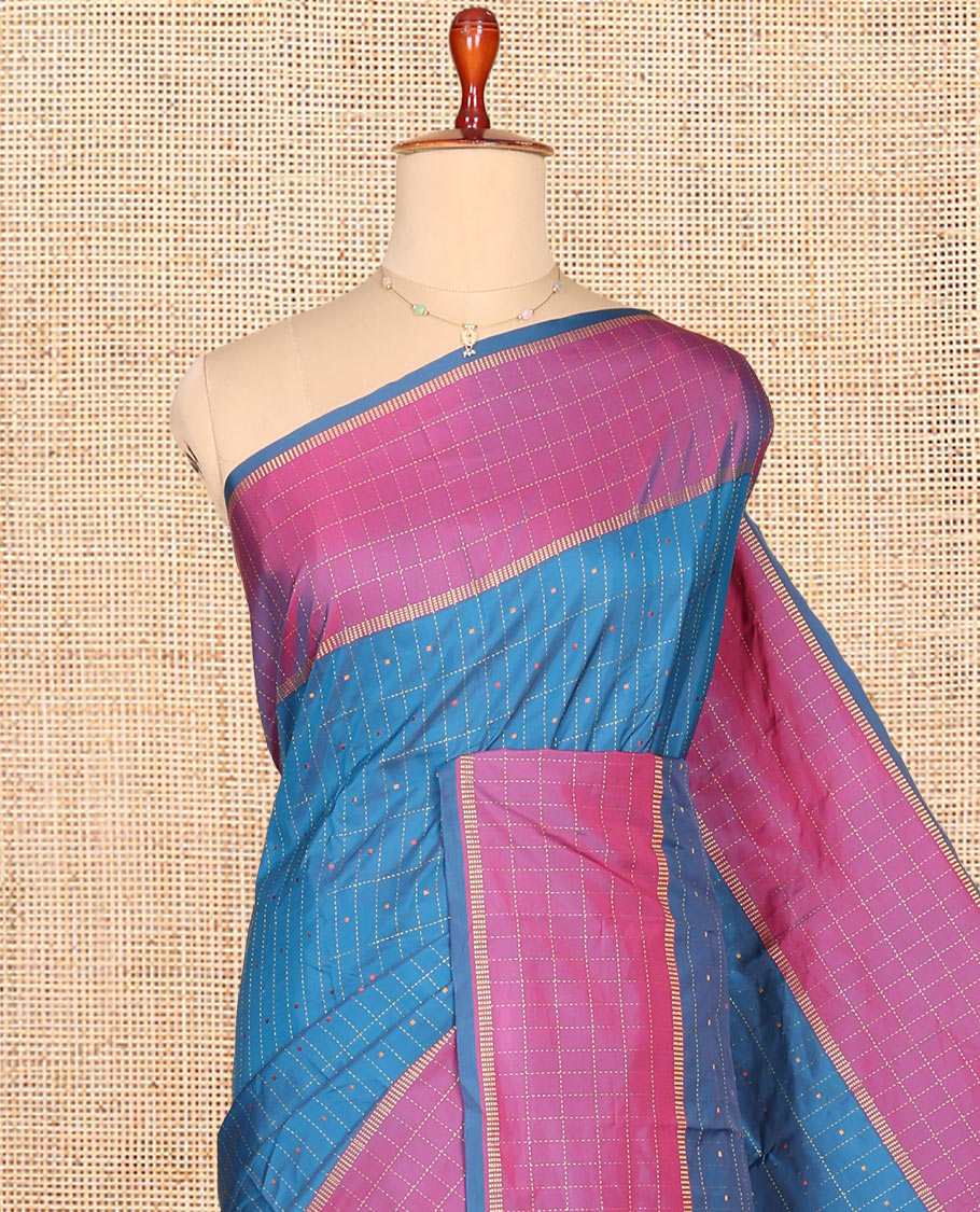 Blue Aarani Gift Saree, Decked up with Butta Enclosed Checked Designs on Its Body, Complemented by a Contrast-Checked Design Border, Zari-Striped Pallu, and Paired with a Contrast Blouse