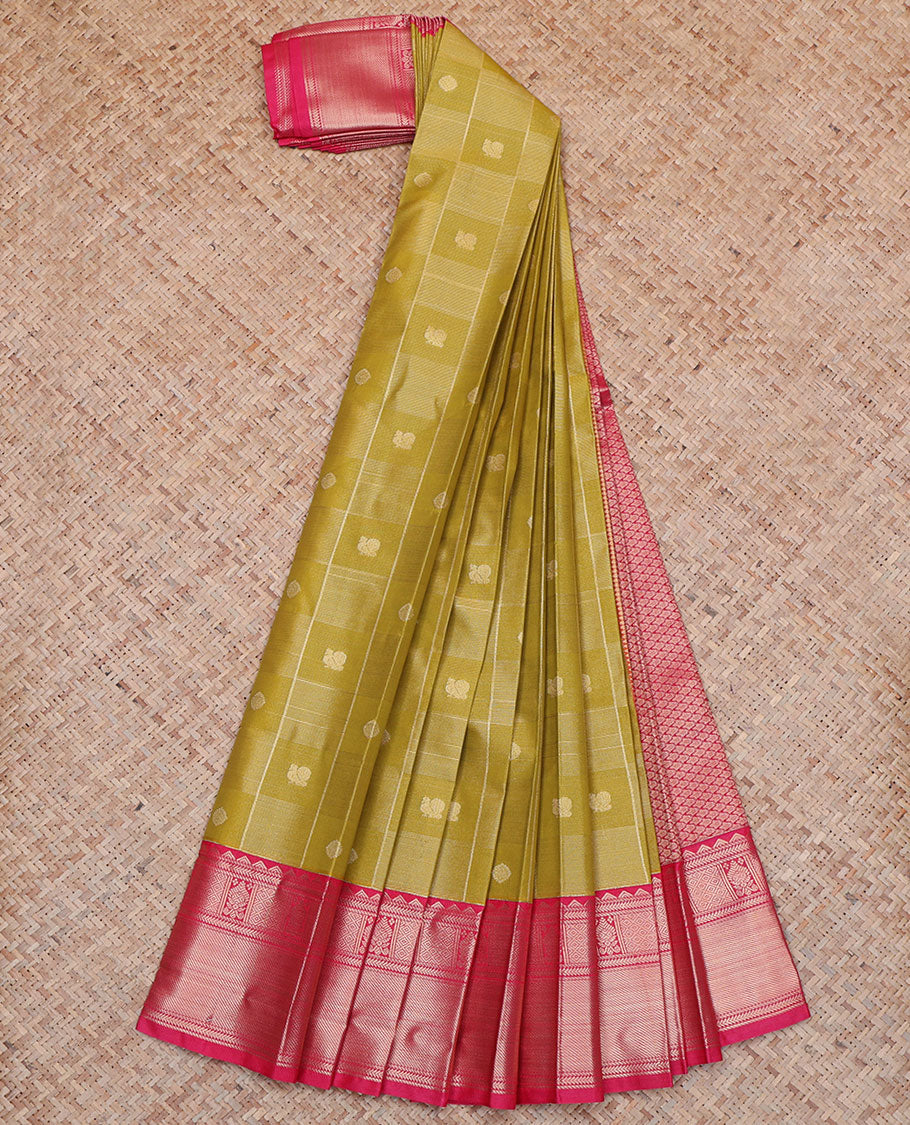 Green Budget Silk Saree, Mesmerized with Peacock and Chakra Buttas All Over Its Body, Complemented by a Contrast Traditional Zari Design Border, Pallu of Jaal Designs, and Paired with a Contrast Blouse