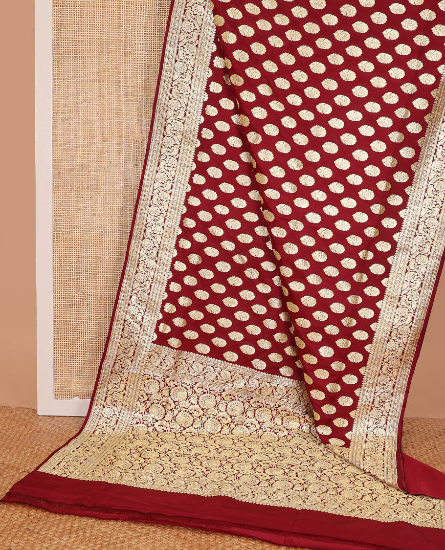 Maroon banarasi silk saree with zari buttas, self-border of floral creeper designs & pallu steeped with floral designs