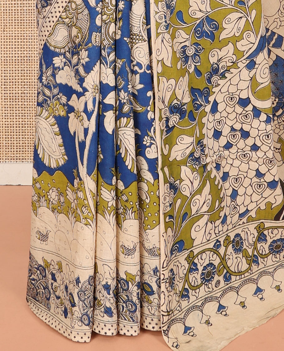 Blue Machine-Printed Kalamkari Cotton Saree Features Floral, Fauna, and Pichwai Lotus, a Contrast-Printed Border, Pallu of Lord Krishna Motifs, and a Contrast Blouse