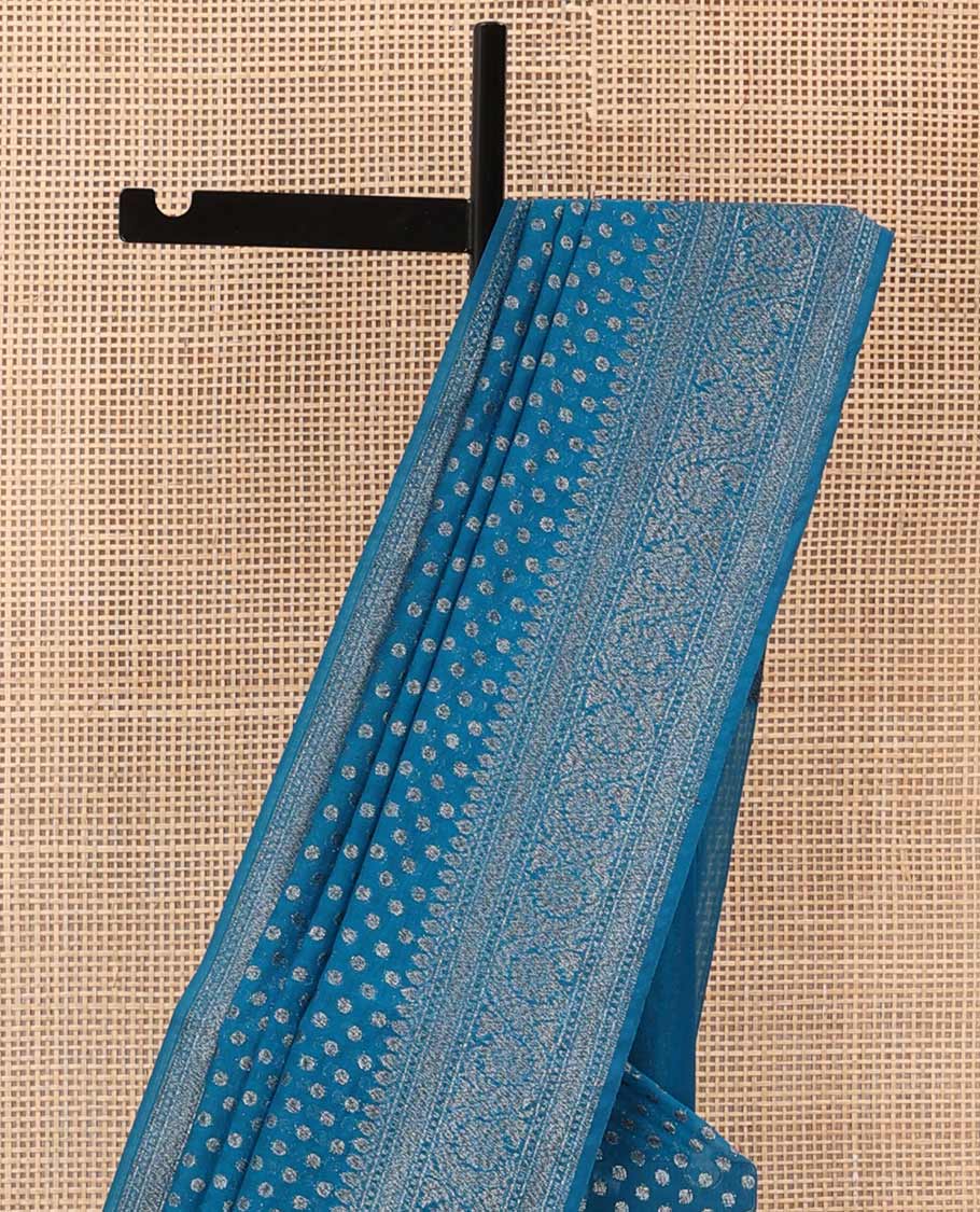 Blue zari buttas fancy saree, zari floral creeper border, and pallu steeped with intricate buttas