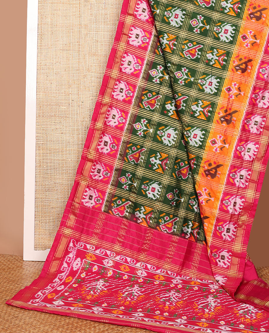 Green patola-style animal motif enclosed checked ikkat saree, contrast elephant motif border & pallu of ikkat designs