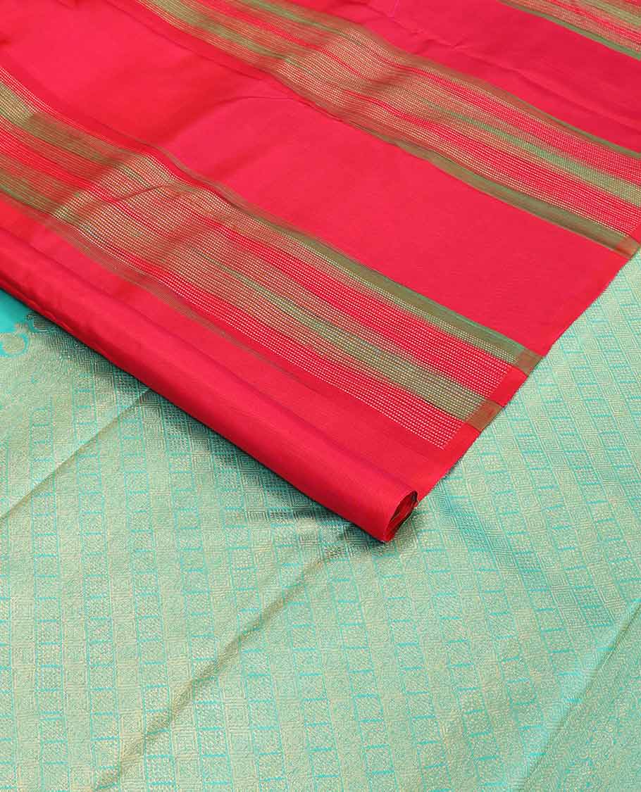 Borderless orange buttas kancheepuram silk saree with argyle design pallu