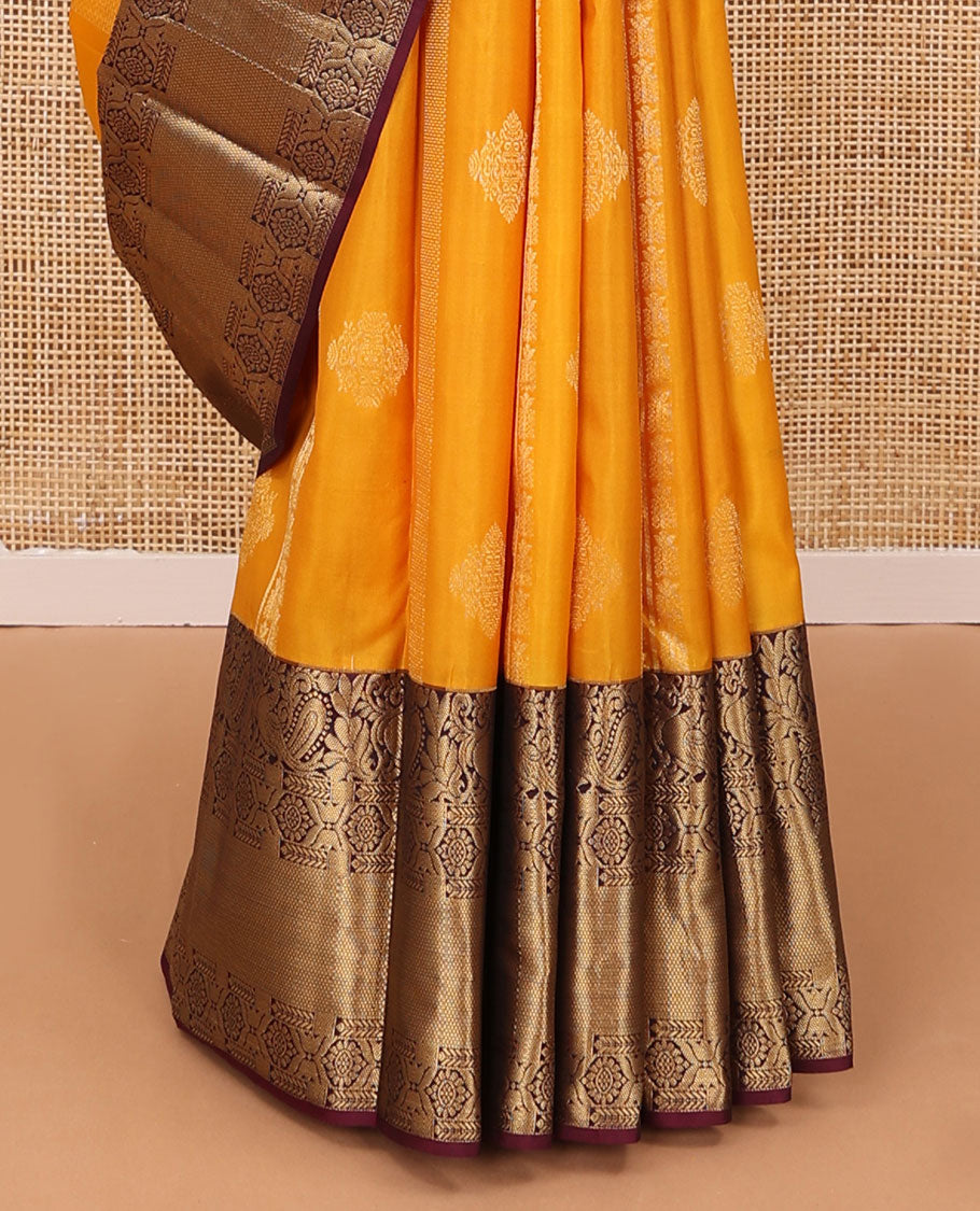Orange zari designs silk saree, contrast border of mayil, chakram, & kuyil kann & jaal pallu