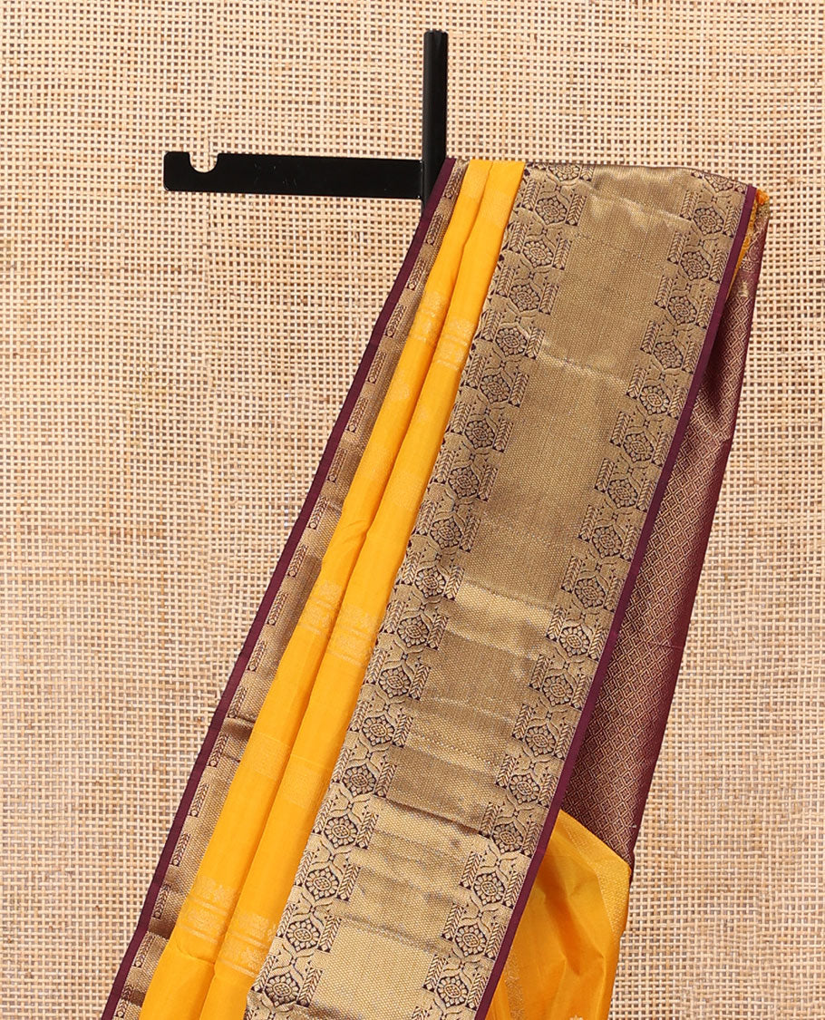 Orange zari designs silk saree, contrast border of mayil, chakram, & kuyil kann & jaal pallu