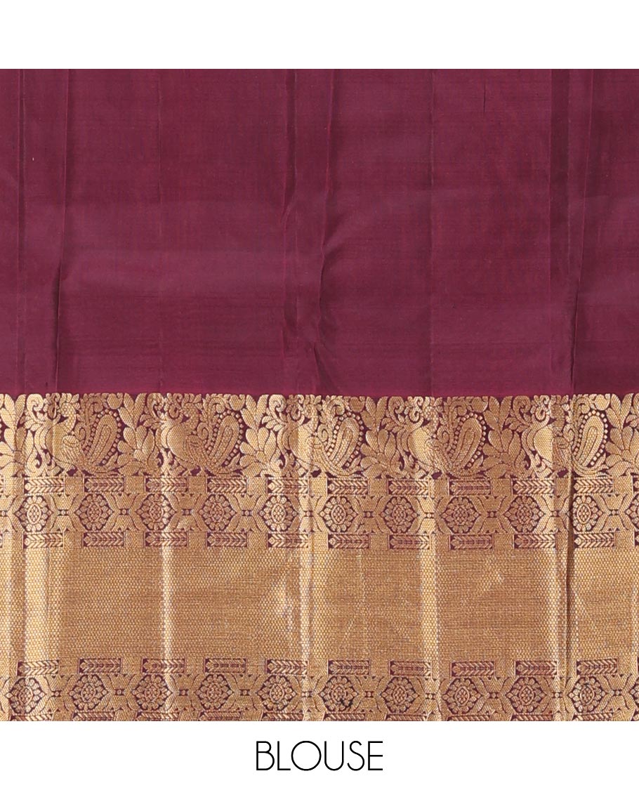 Orange zari designs silk saree, contrast border of mayil, chakram, & kuyil kann & jaal pallu