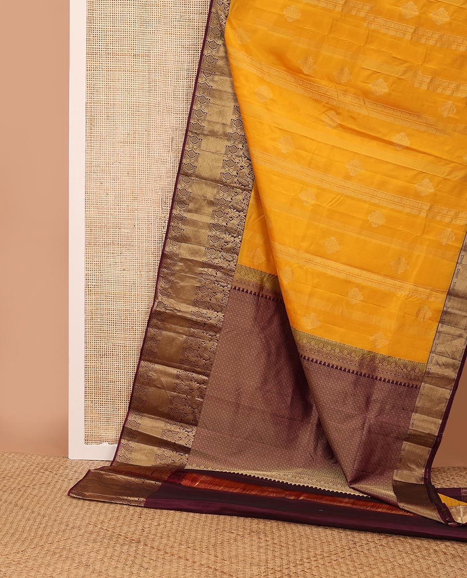 Orange zari designs silk saree, contrast border of mayil, chakram, & kuyil kann & jaal pallu