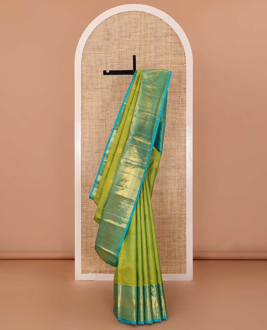 Leaf green zari buttas checked Kanchipuram silk saree, contrast border of ara bogudi,chakram and kuyil kann and jaal pallu