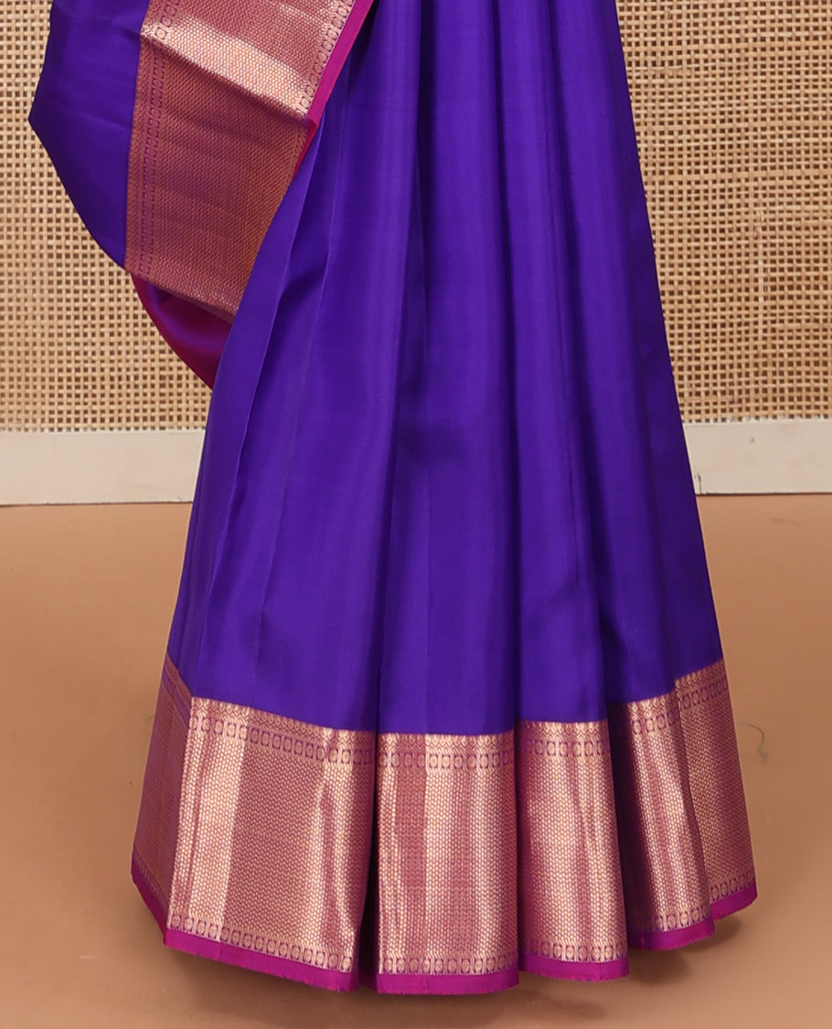 Violet plain Kanchipuram silk saree, contrast border of thilakam, banaras, kuyil kann, and rudraksham designs, and jaal pallu