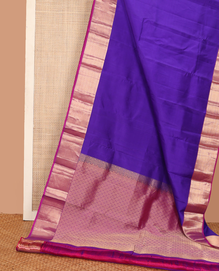 Violet plain Kanchipuram silk saree, contrast border of thilakam, banaras, kuyil kann, and rudraksham designs, and jaal pallu