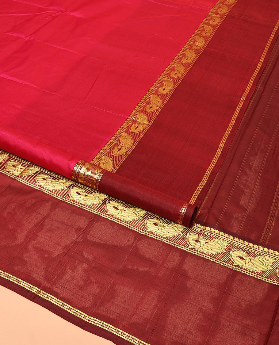 Red Plain Kanchipuram Silk Saree, Complemented by a Contrast Rettai Pettu Border of Manga, Neli, Banaras, and Meen Designs, Pallu of Zari Designs, and Paired with a Contrast Blouse