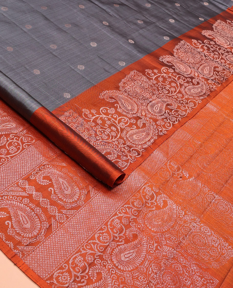 Grey zari buttas soft silk saree, contrast border of paisleys and chakram designs, and pallu of intricate designs