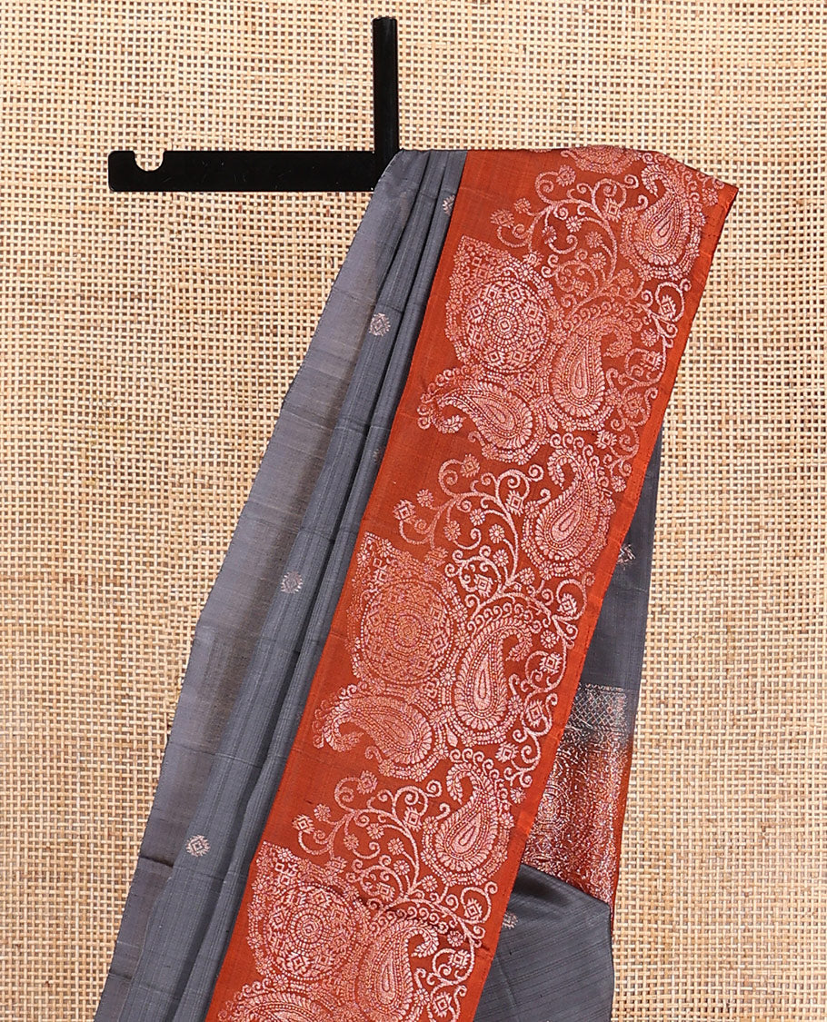 Grey zari buttas soft silk saree, contrast border of paisleys and chakram designs, and pallu of intricate designs