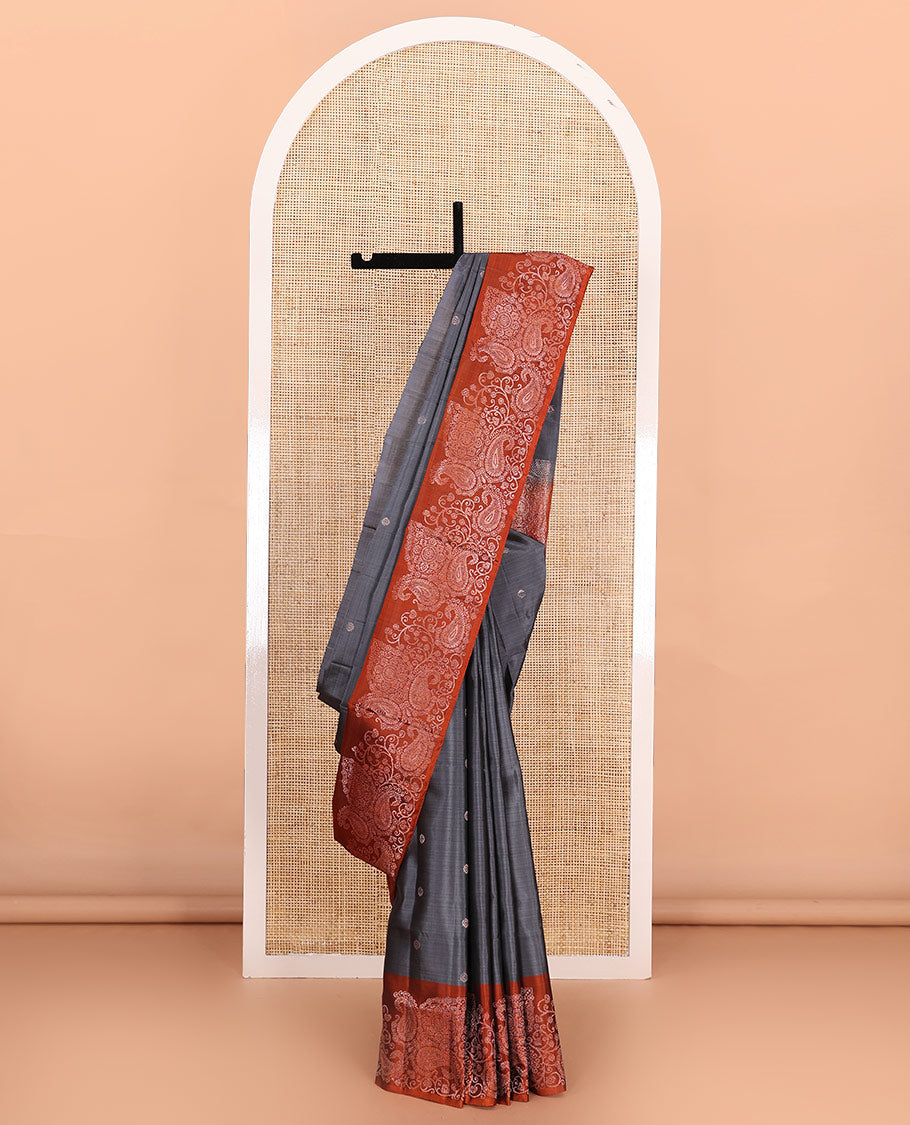 Grey zari buttas soft silk saree, contrast border of paisleys and chakram designs, and pallu of intricate designs