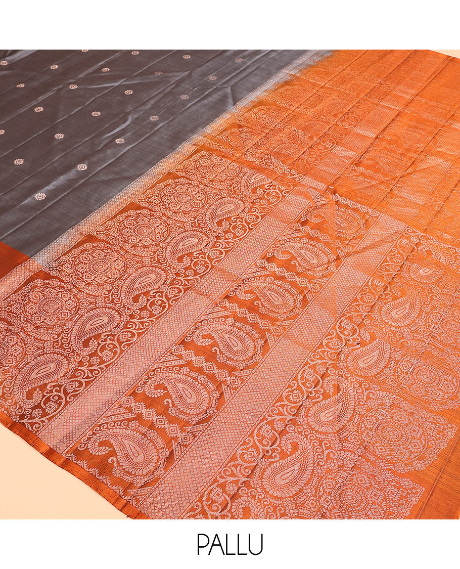 Grey zari buttas soft silk saree, contrast border of paisleys and chakram designs, and pallu of intricate designs