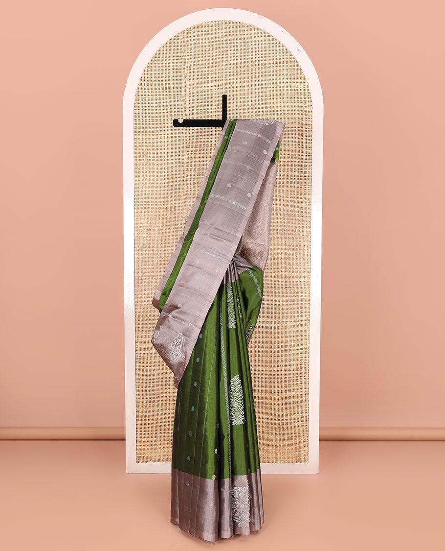 Green zari buttas and neli stripes soft silk saree, contrast zari buttas and neli striped border, and jaal pallu