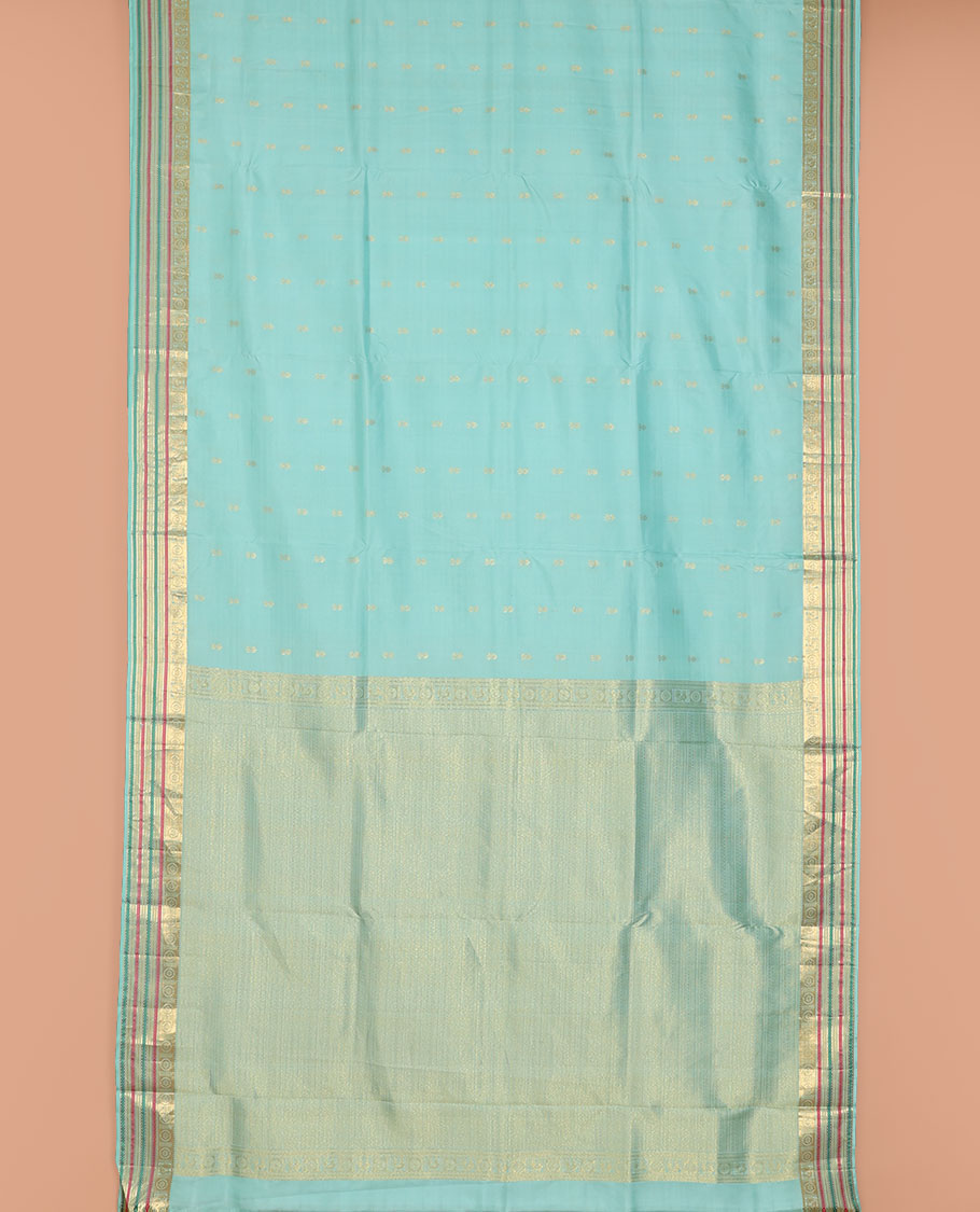 Blue nine-yard silksaree with zari buttas,zari border of rekku,mayil chakram,mayil kann,banaras & neli & intricate pallu