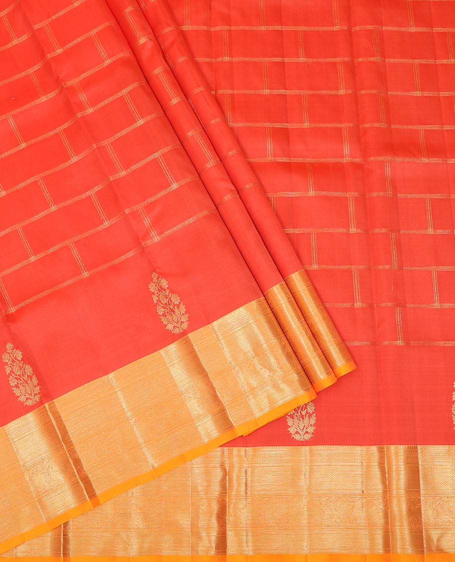 Red zari checked pure-silk half-saree with contrast traditional border of peacock designs, contrast zari bordered blouse, and a dhavani of intricate designs