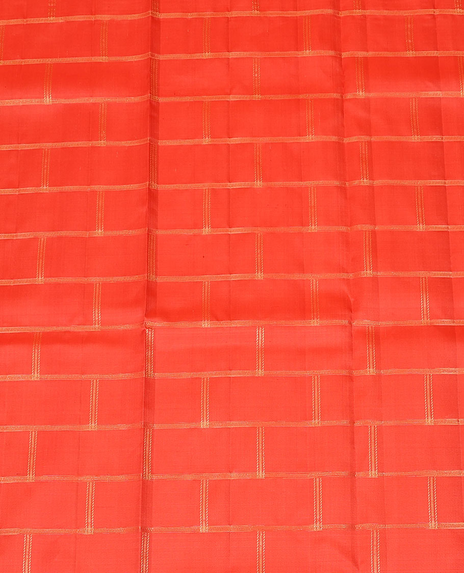 Red zari checked pure-silk half-saree with contrast traditional border of peacock designs, contrast zari bordered blouse, and a dhavani of intricate designs