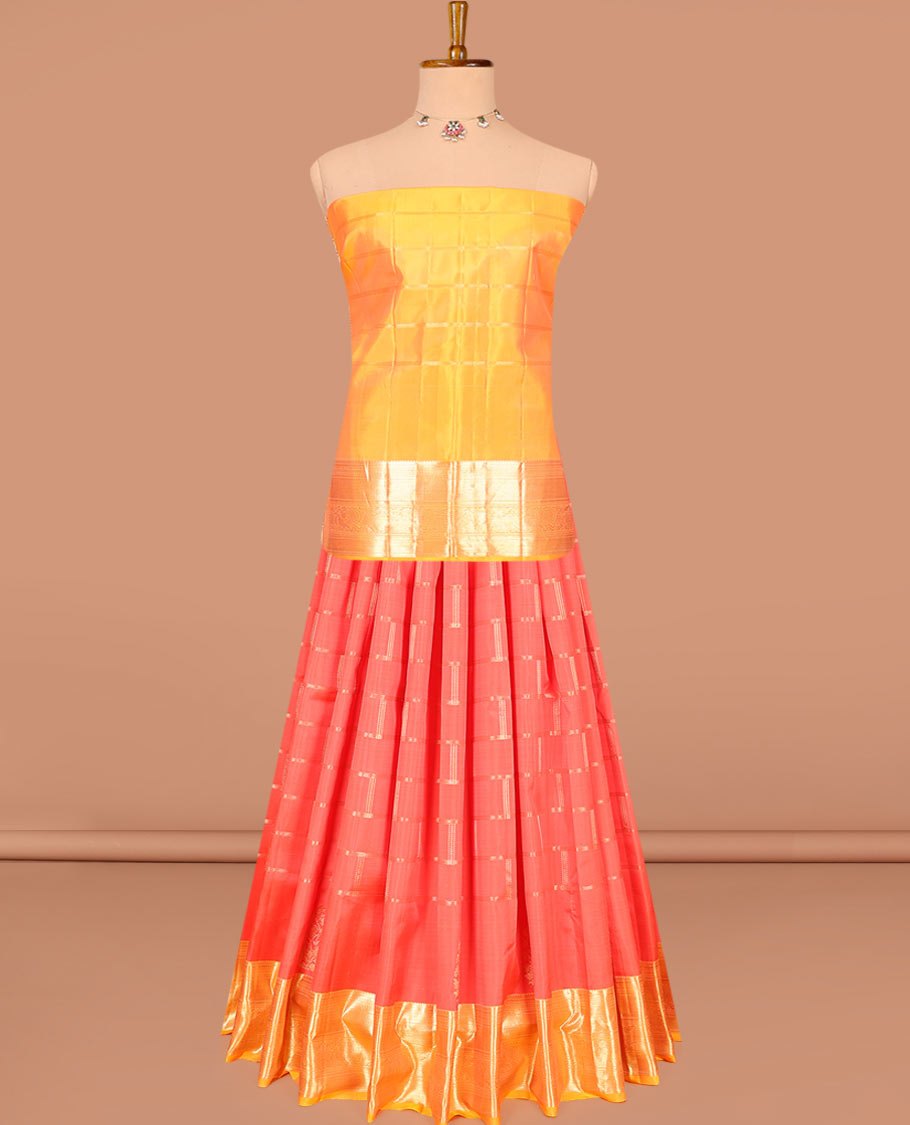 Red zari checked pure-silk half-saree with contrast traditional border of peacock designs, contrast zari bordered blouse, and a dhavani of intricate designs