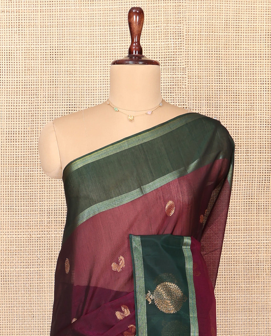 Maroon Silk Cotton Saree, Artfully Woven with Peacock and Rudraksham Motifs On Its Body, Complemented by Contrast Zari Motifs Woven Border, Geometric Zari Patterned Pallu and Paired with a Contrast Blouse