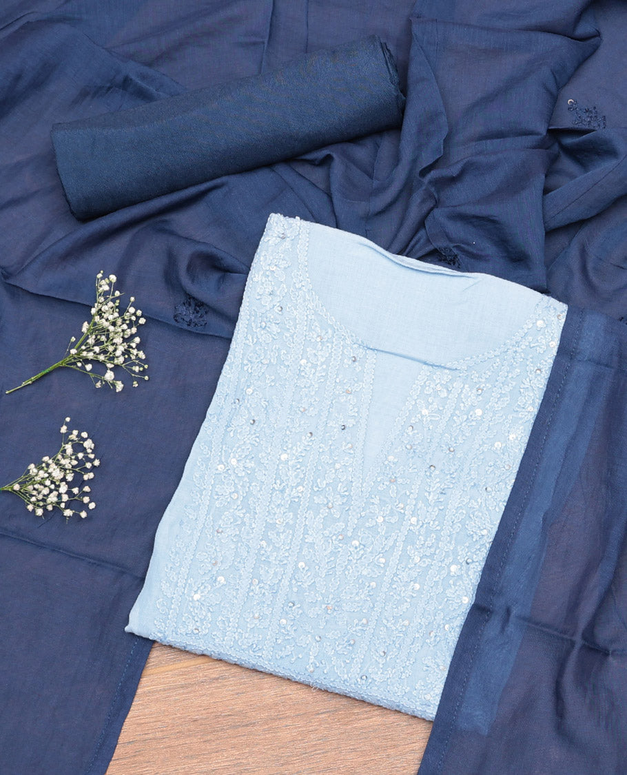 Baby Blue Cotton Material Churidar Set, Finely Crafted with Sequined Thread Neck Work Top, a Contrast Plain Bottom, and Thread Dupatta