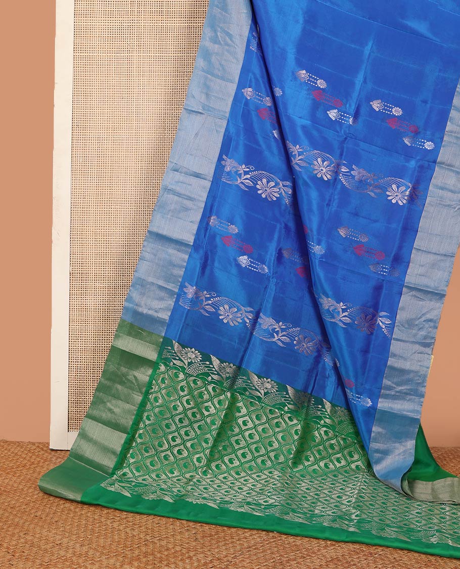 Blue floral zari design Uppada saree, bavanji border, and ogee patterned pallu