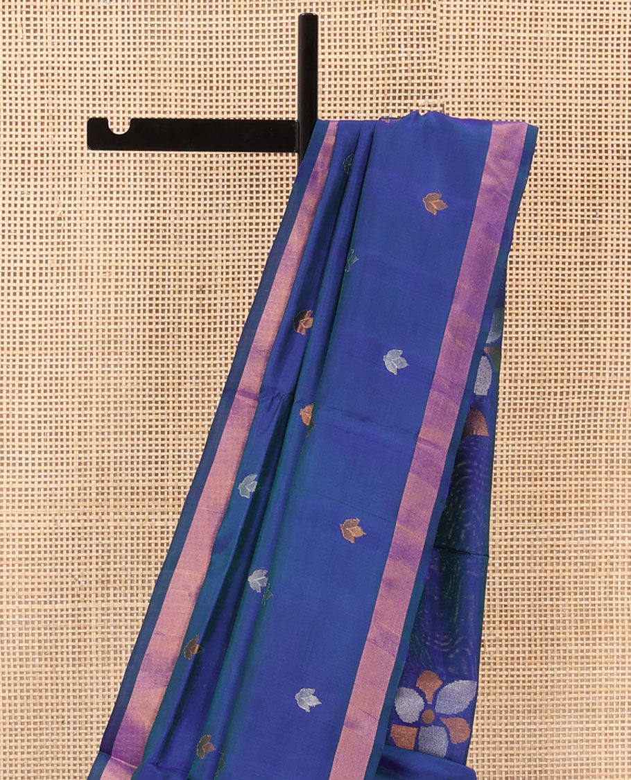 Blue Uppada Silk Saree Featuring Floral Buttas, Subtle Zari Bavanji Border, Pallu Decked Up with Jamdani-Style Floral Motifs, and Paired with a Matching Blouse