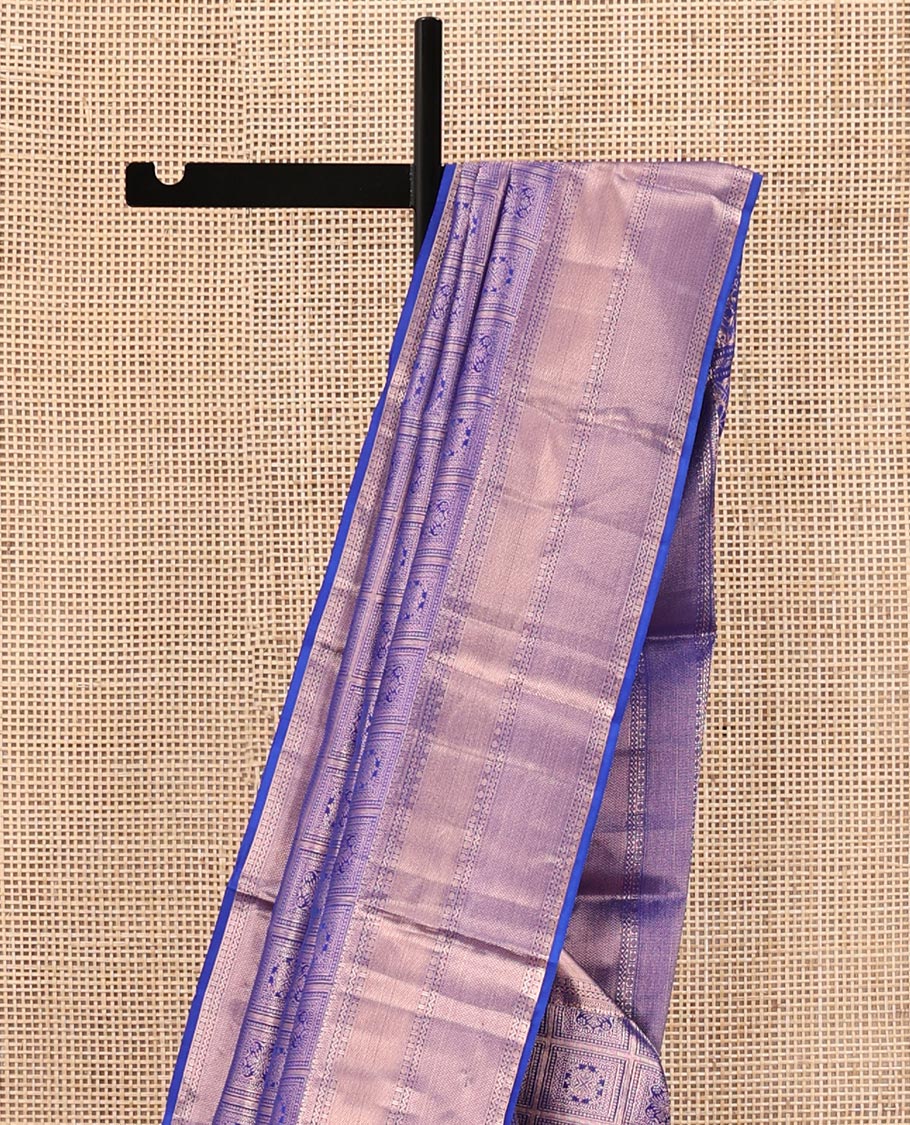Blue Kanchipuram Wedding Silk Saree, Meticulously Crafted with Jacquard Designs on Its Body, Highlighted by a Zari Border of Muthu, Neli, Rudraksham, and Vanki Designs, Opulently Embellished Pallu, and Paired with a Matching Blouse