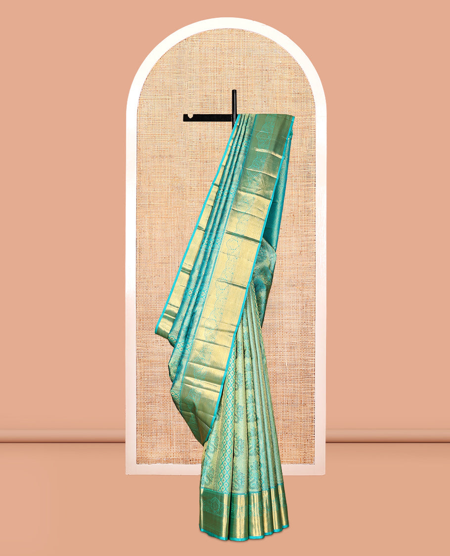 Blue Kanchipuram Wedding Silk Saree, Decked Up with Jacquard Design, Zari Border of Thilakam Mokku, and Manga Designs, Grand Jaal Pallu, and a Matching Blouse