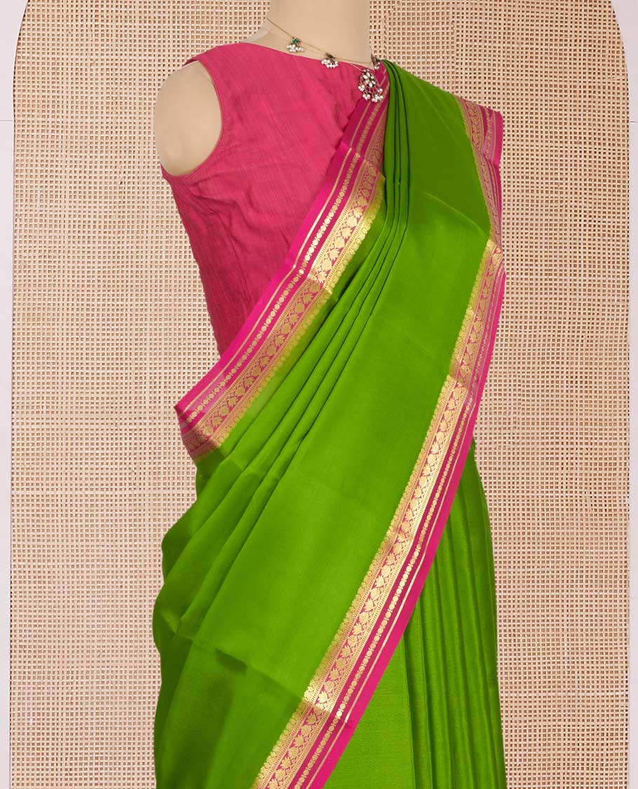 Parrot Green Plain Mysore Silk Saree, Complemented by a Contrast Traditional Zari Design Border, Zari-Striped Pallu, and Paired with a Contrast Blouse